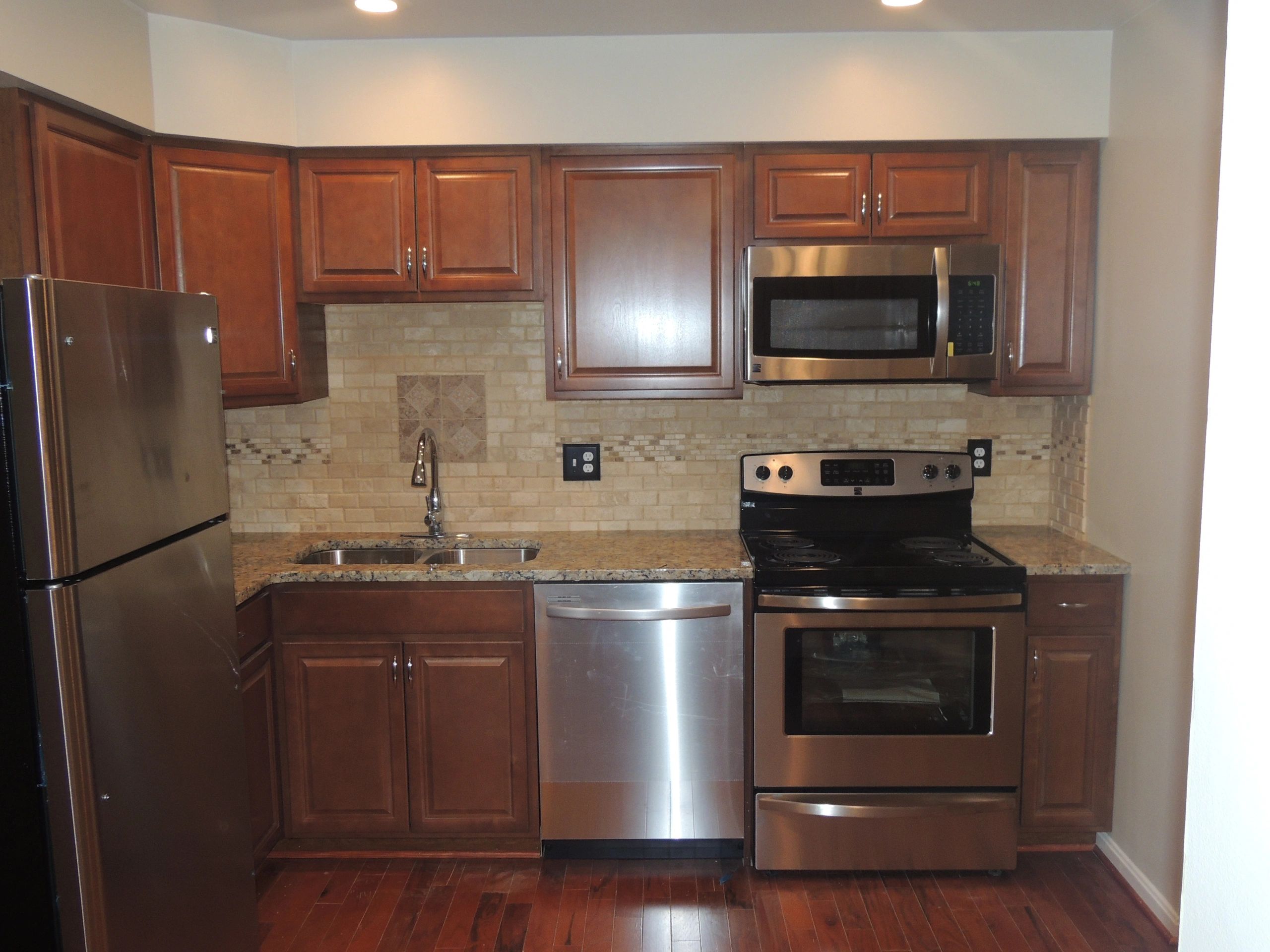 Cherry wood kitchen cabinets